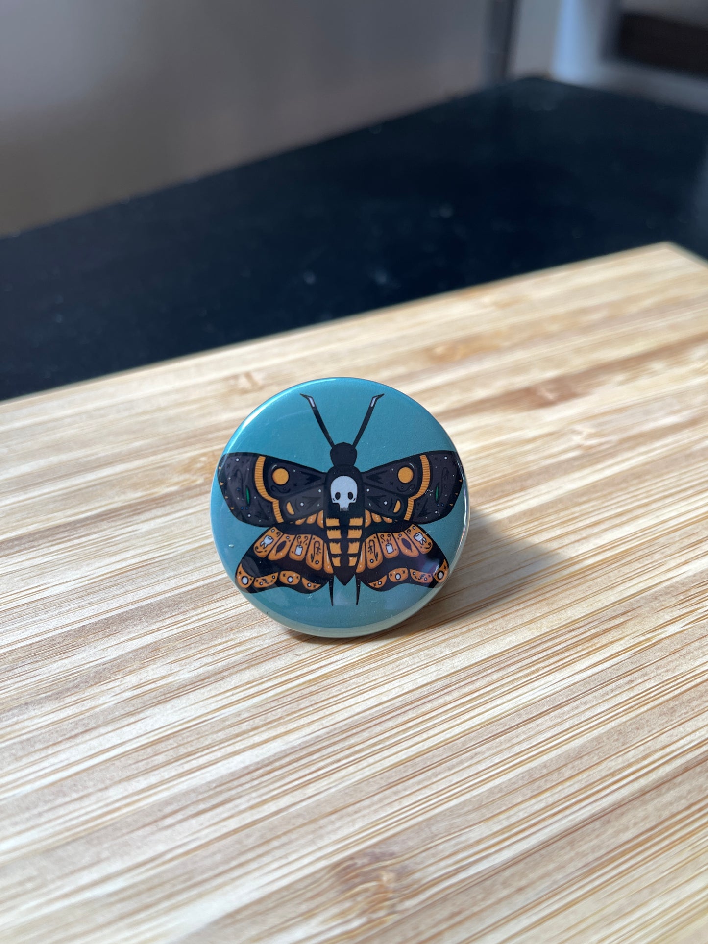 Death Moth Button